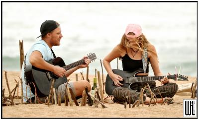 The Vast Oddity having a jamming session on the beach The Vast Oddity