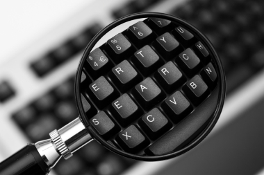 Keyboard and magnifying glass