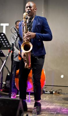 Versatile Saxophone player Thami Mahlangu playing the Saxophone Image by Lindo Mbhele Versatile Saxophone player Thami Mahlangu playing the Saxophone