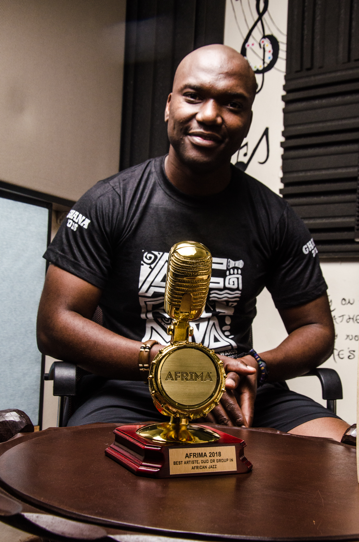 Pianist, Sibusiso Mash Mashiloane with his All Africa Music Award